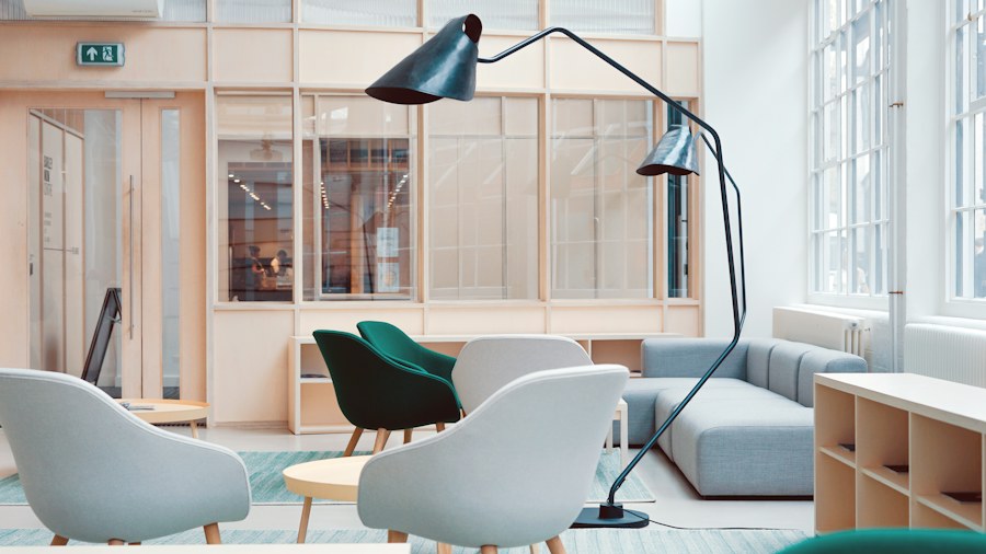 A bright shared workspace with comfortable seating