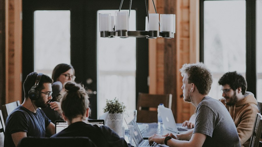 A small group discussing ideas around a table