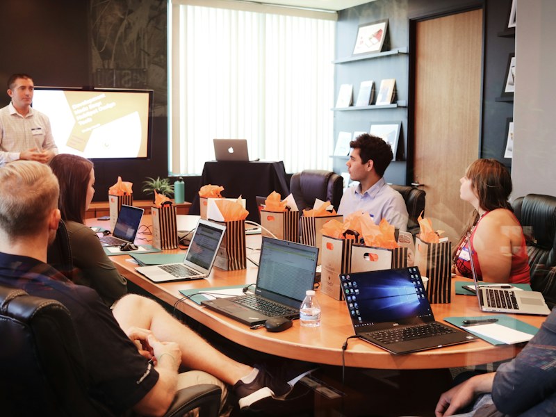A presenter leading a team learning session